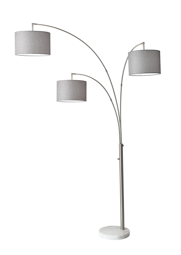 74" Brass Three Light Arc Floor Lamp With Off White Fabric Drum Shade