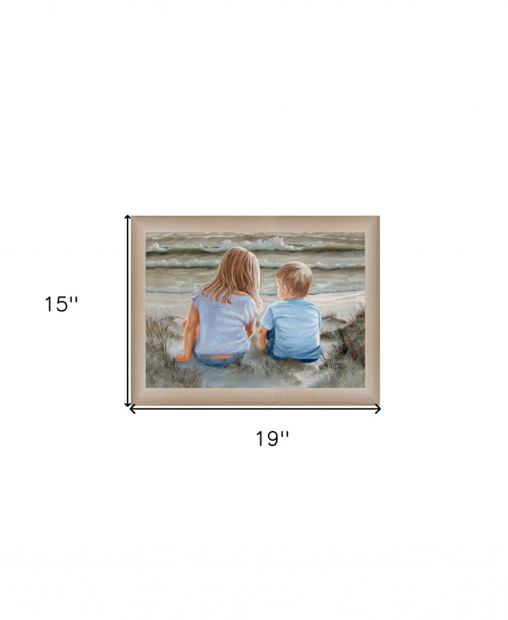 Boy and Girl Sitting in Dunes Brown Framed Print Wall Art