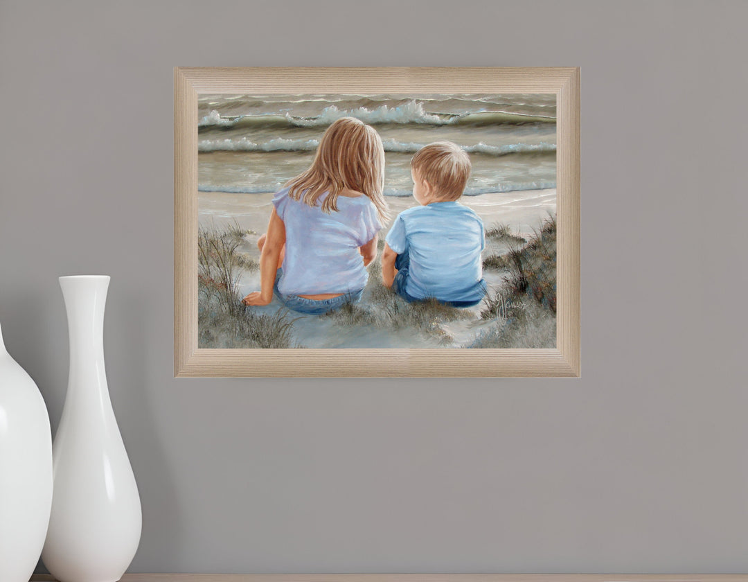 Boy and Girl Sitting in Dunes Brown Framed Print Wall Art