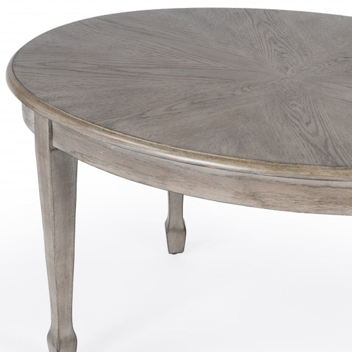 38" Gray Oval Wood Scoring & Rub Through Coffee Table