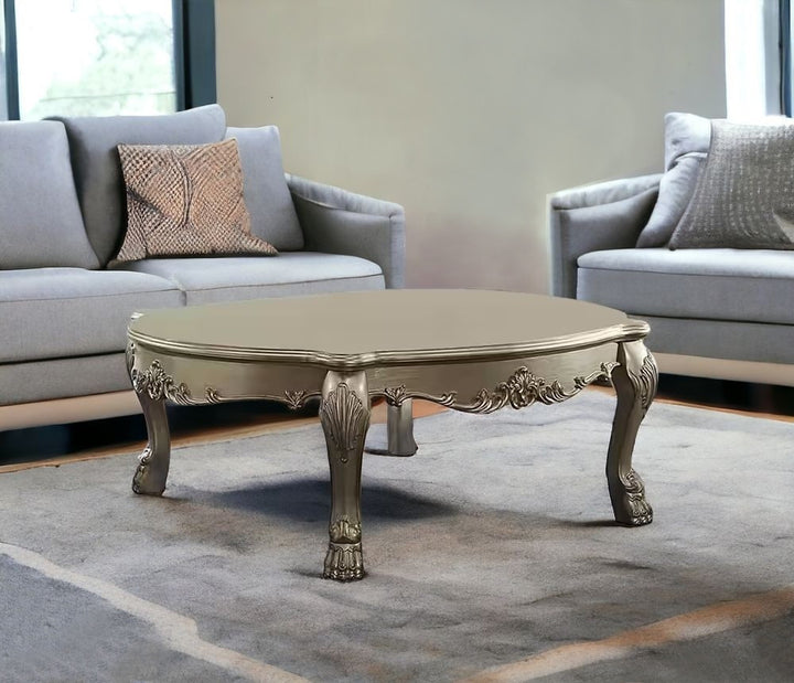 54" Gold And Bone Solid And Manufactured Wood Coffee Table