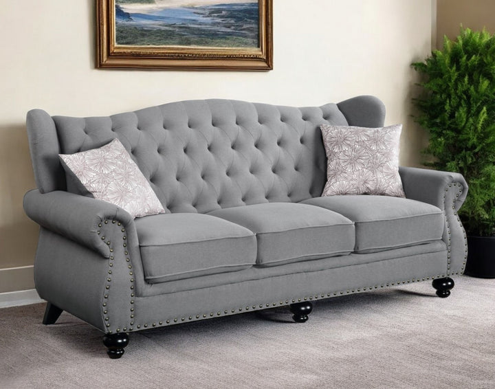 86" Gray Sofa And Toss Pillows With Black Legs