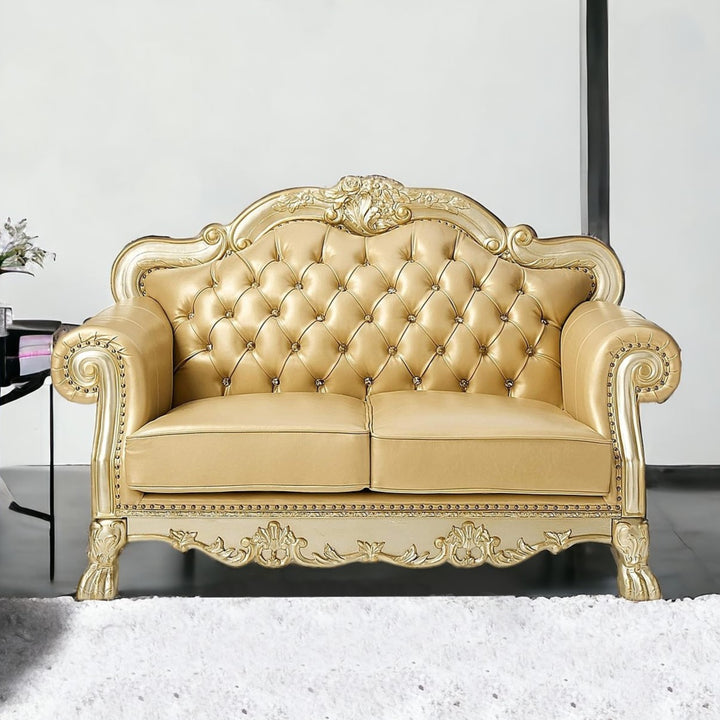 64" Bone And Gold Faux Leather Loveseat and Toss Pillows