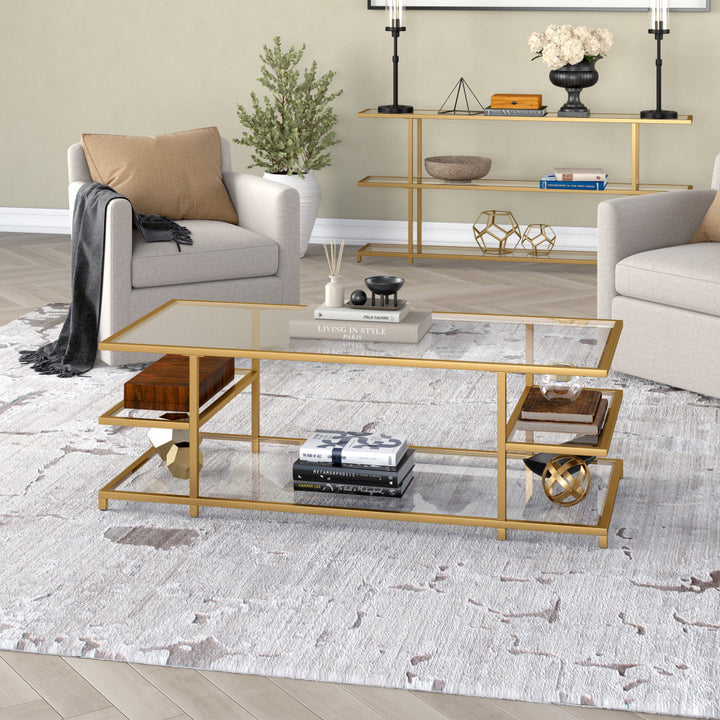 54" Gold Glass And Steel Coffee Table With Three Shelves